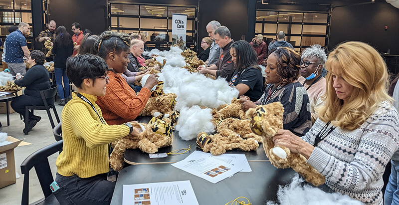 CCM employees stuffing bears
